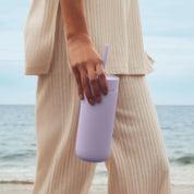 Fellow Carter Cold Tumbler in matte stainless steel with reusable straw, ceramic-coated interior, and spill-resistant lid. Available in 16 oz size.