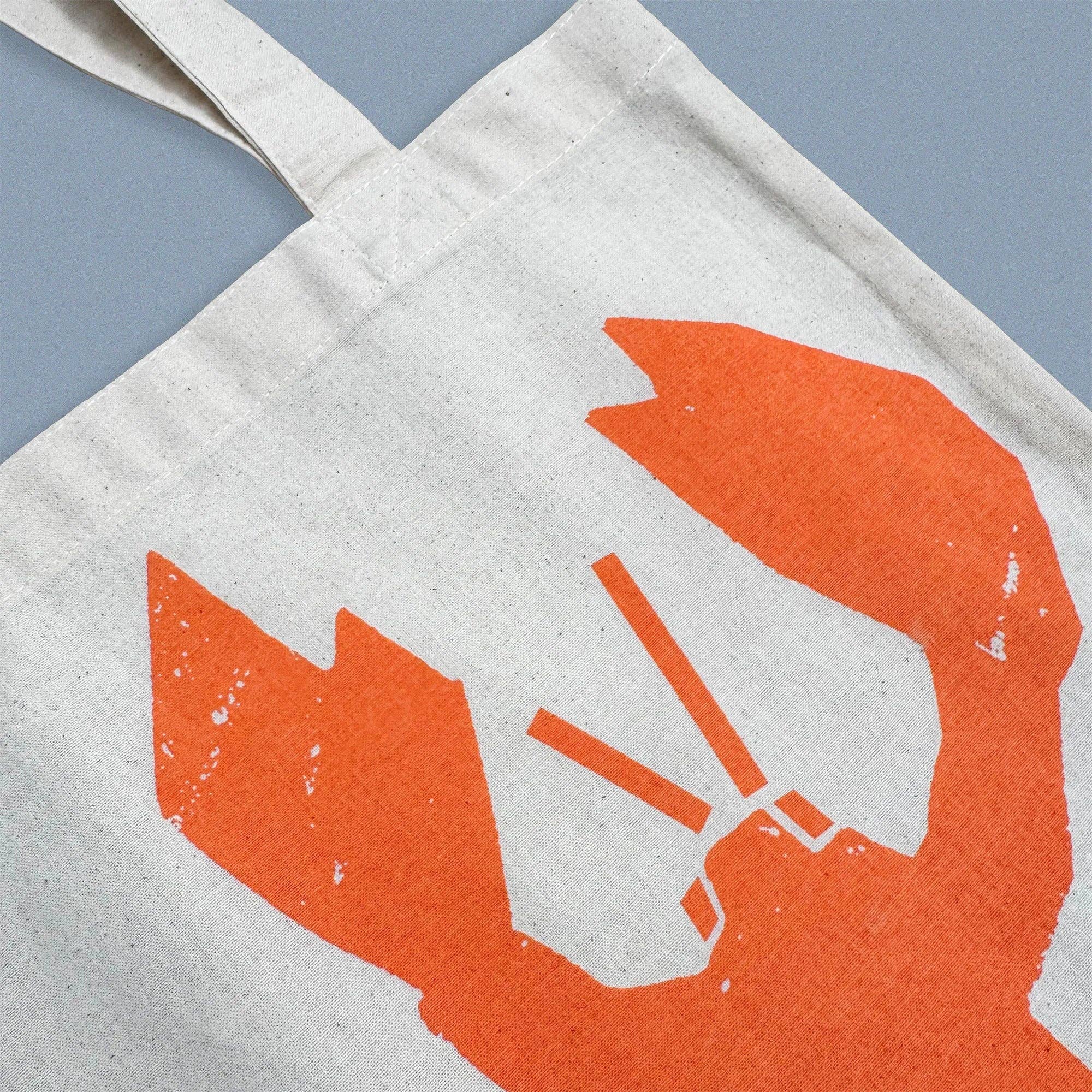 Lobster Catch Tote Bag by Kautzi Illustrations with a bright orange lobster screen-printed on natural cotton.