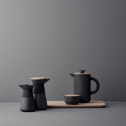 Stelton Theo Set in matte black stoneware with glossy interior, designed by Francis Cayouette. Rustic yet modern Nordic.
