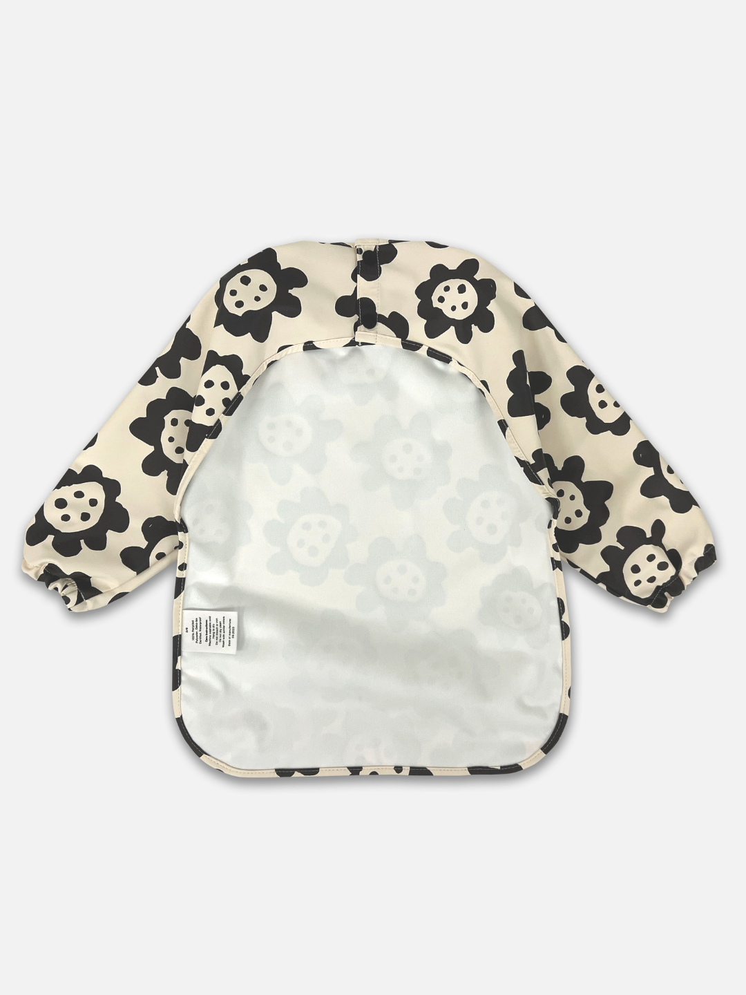 Long sleeve smock bib in six artist-designed colorways. Waterproof, recycled fabric, fits 6 months–3 years—extra coverage for mealtime and crafts.