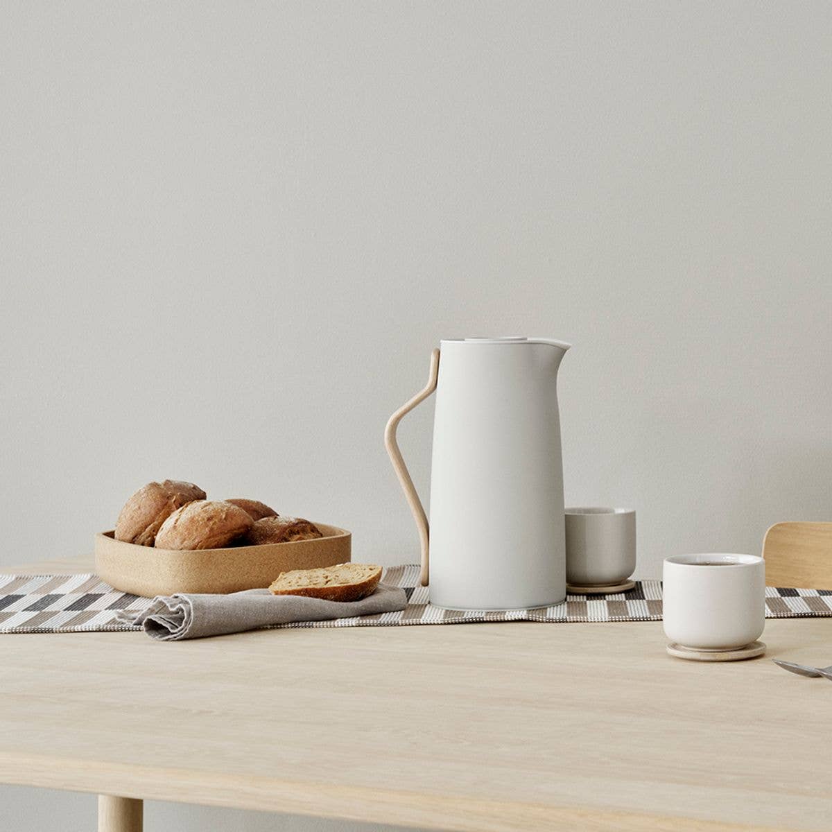 Stelton Emma Vacuum Coffee Jug in sand lacquered steel with beechwood handle. Thermal coffee jug keeps coffee hot for hours, 1.2 L. Designed by HolmbäckNordentoft.