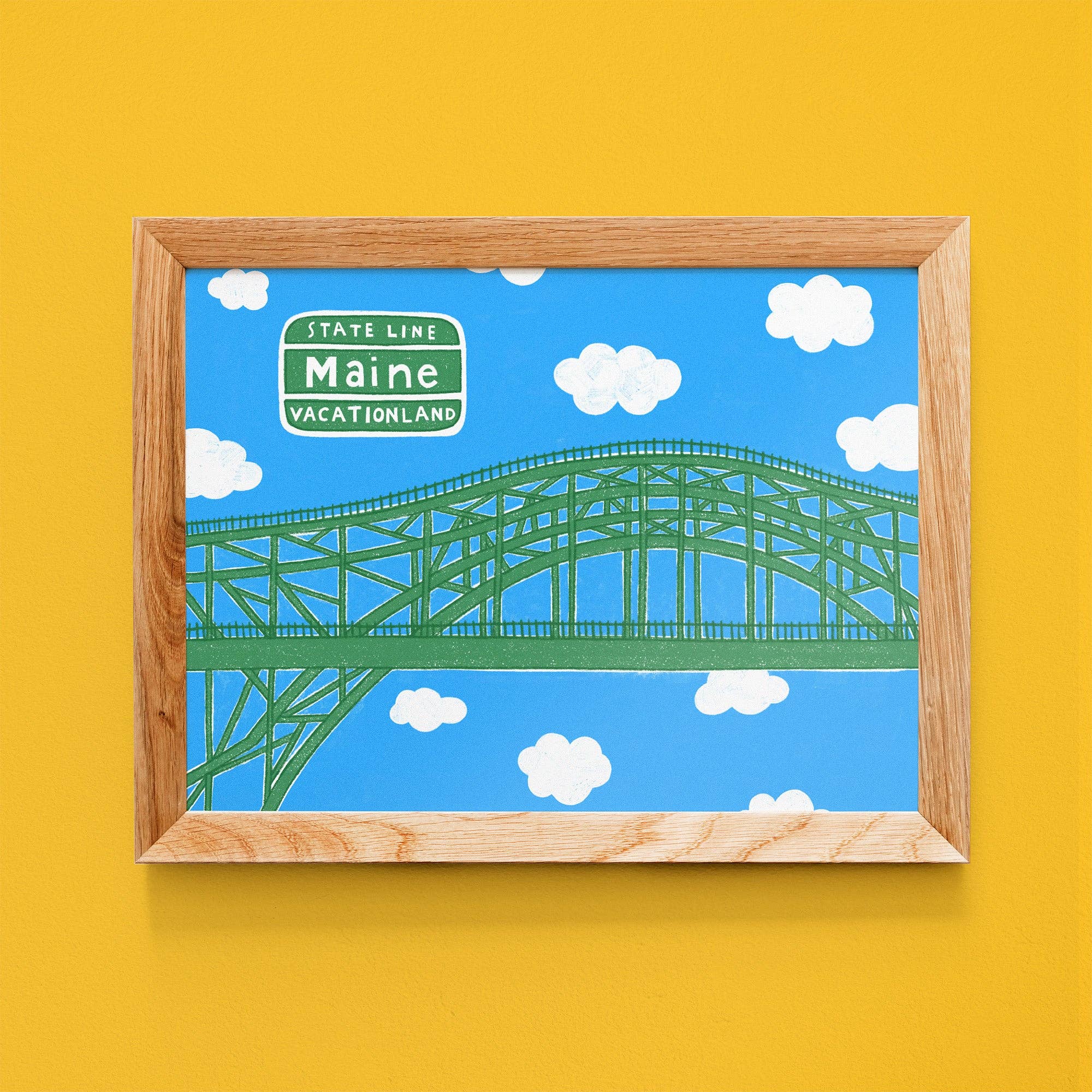 Vacationland Print by Little Something Co. featuring the green Piscataqua River Bridge, Maine Vacationland sign, white clouds, and bright blue sky.