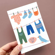Hello Little One Card by Kautzi Illustrations featuring a colorful clothesline illustration welcoming a new baby.