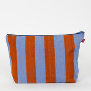 Carla Toilet Bag by A World of Craft in blue and brown handwoven cotton stripes with nylon lining, Fair Trade handmade in Guatemala.