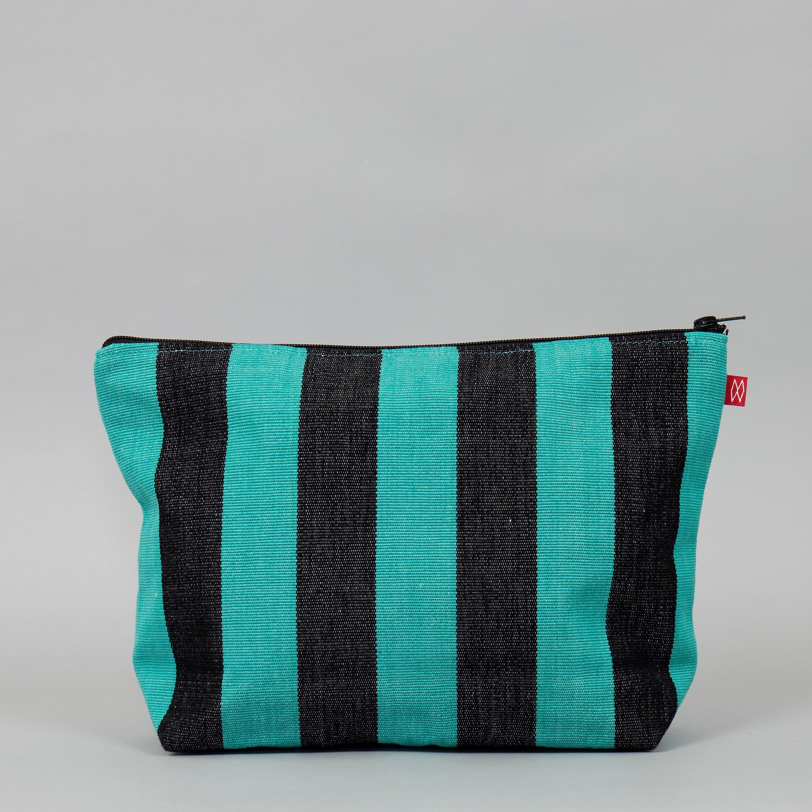 Carla Toilet Bag by A World of Craft in black and turquoise handwoven cotton stripes with nylon lining, Fair Trade handmade in Guatemala.