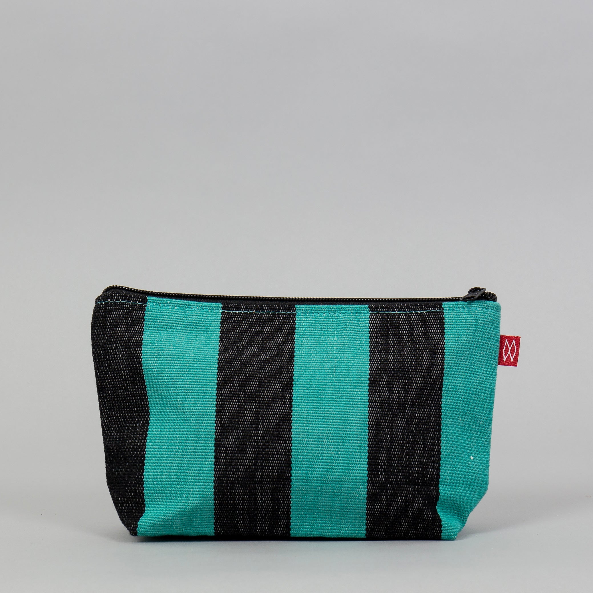 Carla Toilet Bag by A World of Craft in black and turquoise handwoven cotton stripes with nylon lining, Fair Trade handmade in Guatemala.