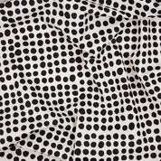 A World of Craft Dots Tablecloth, 140 × 260 cm, in white cotton with black dot print. Fair Trade, handmade in Bangladesh.
