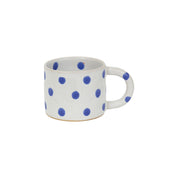 Blot Coffee Cup in matte light grey stoneware with glossy blue dots. Handmade in Nepal, fair trade.