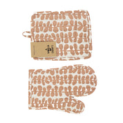 A World of Craft Foliage oven mitt and potholder in pink and off-white block print cotton with padded insulation. Handmade & Fair Trade in Bangladesh.