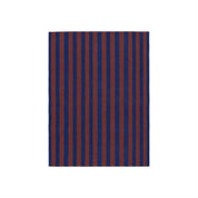 Zora Towel by A World of Craft in handwoven cotton with dark blue and brown vertical stripes.