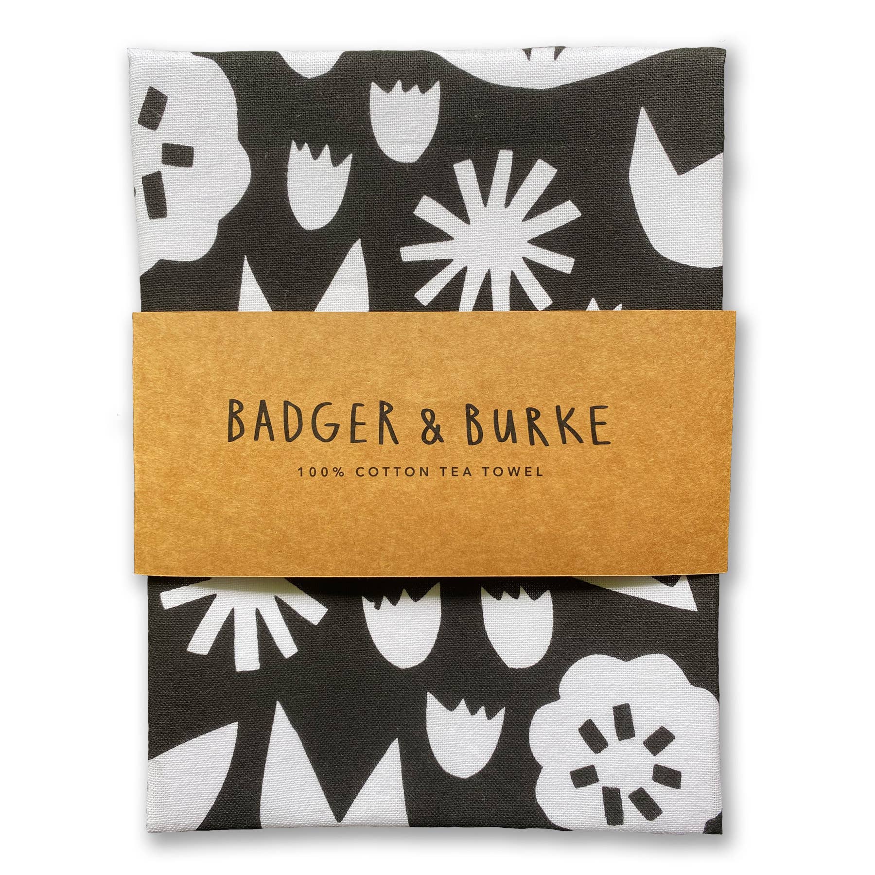 Badger & Burke June Floral Tea Towel. Bold black-and-white floral cotton towel with hanging loop. Pairs perfectly with the June Birch Tray.