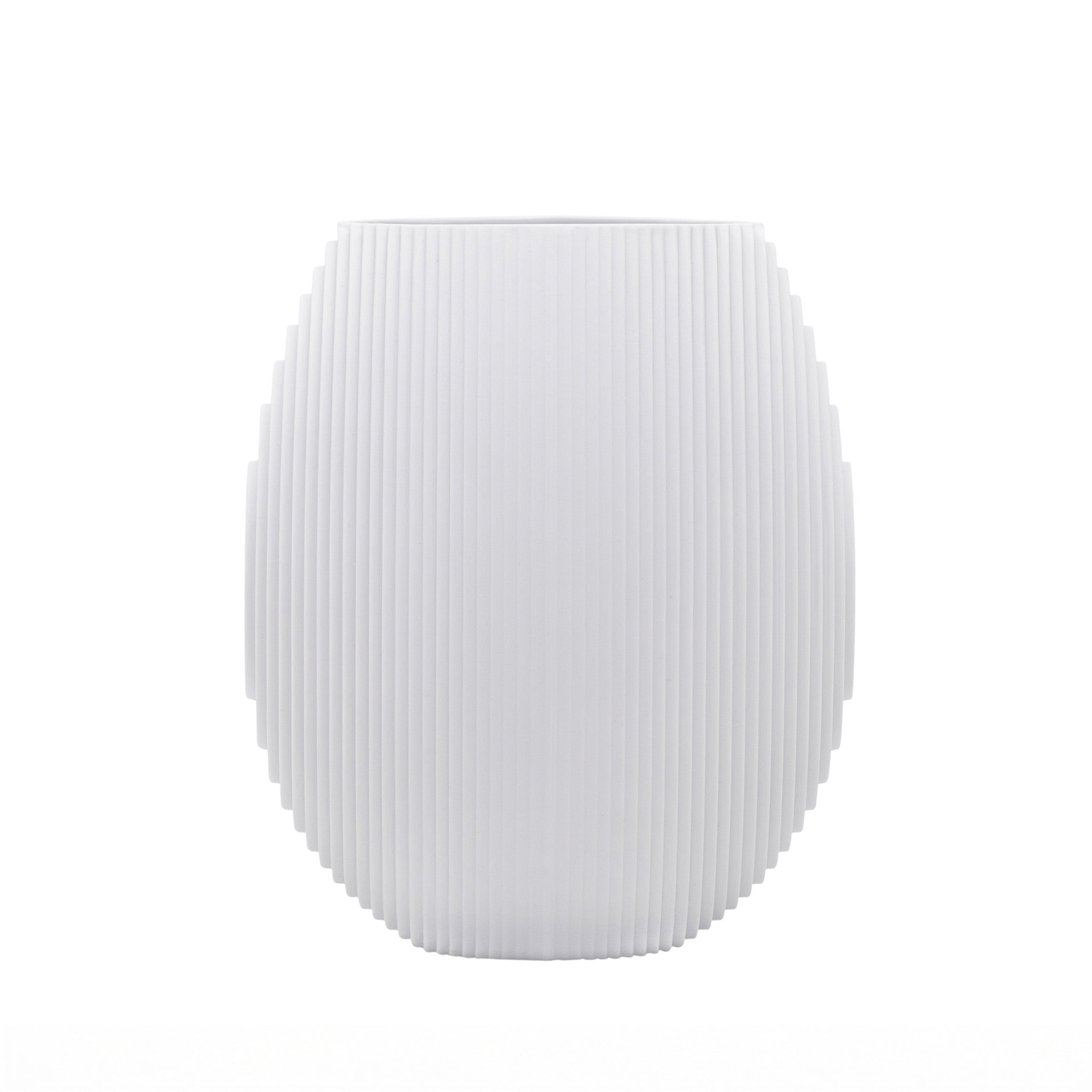 Architectmade Flow Vases in white porcelain, designed by Vibeke Rytter. Inspired by water ripples and Copenhagen’s Grundtvig’s Church.