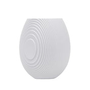 Architectmade Flow Vases in white porcelain, designed by Vibeke Rytter. Inspired by water ripples and Copenhagen’s Grundtvig’s Church.