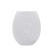 Architectmade Flow Vases in white porcelain, designed by Vibeke Rytter. Inspired by water ripples and Copenhagen’s Grundtvig’s Church.