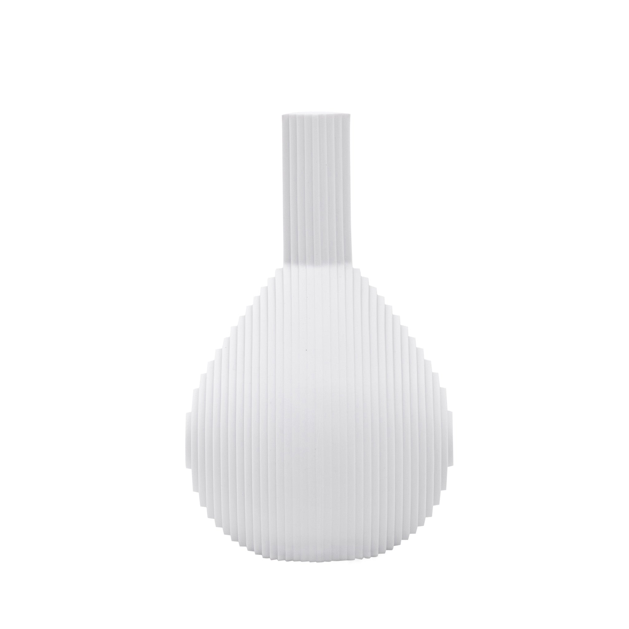 Architectmade Flow Vases in white porcelain, designed by Vibeke Rytter. Inspired by water ripples and Copenhagen’s Grundtvig’s Church.