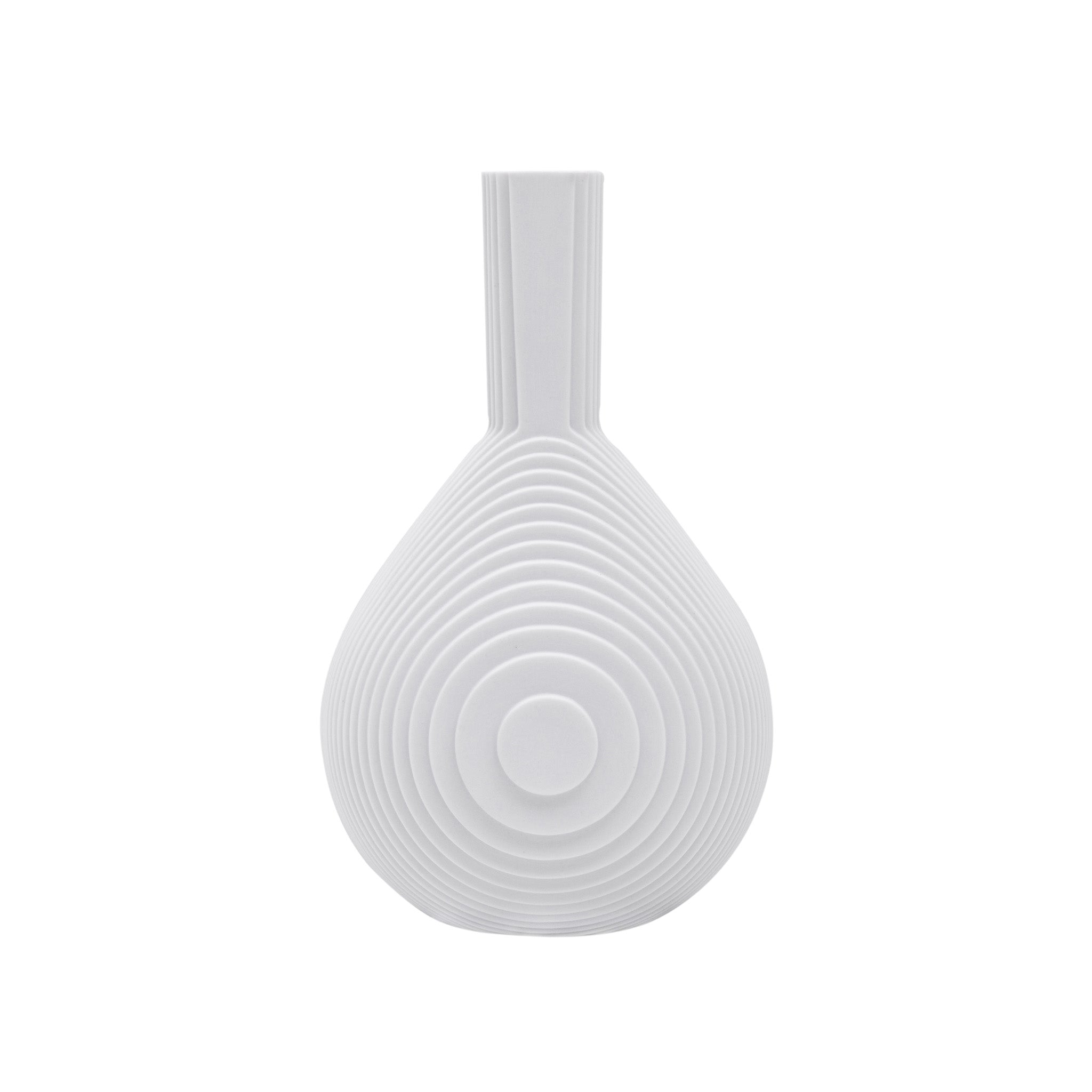 Architectmade Flow Vases in white porcelain, designed by Vibeke Rytter. Inspired by water ripples and Copenhagen’s Grundtvig’s Church.