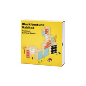 Areaware Blockitecture Habitat wooden block set with painted building facades in red, teal, navy, and white.