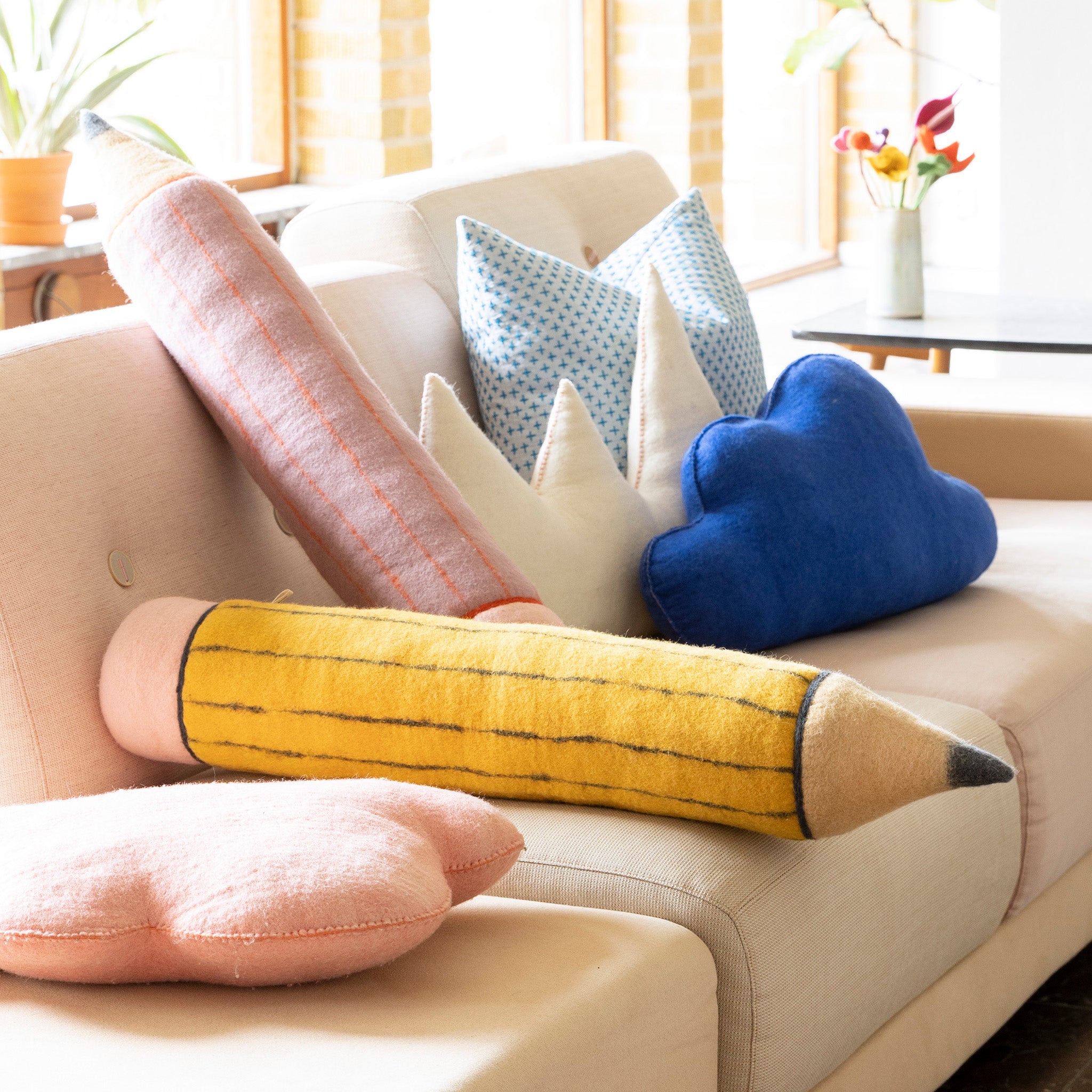 Aveva Design Cushions, handmade from 100% wool in Nepal. Fun shaped pillows for kids’ rooms or cozy adult décor.