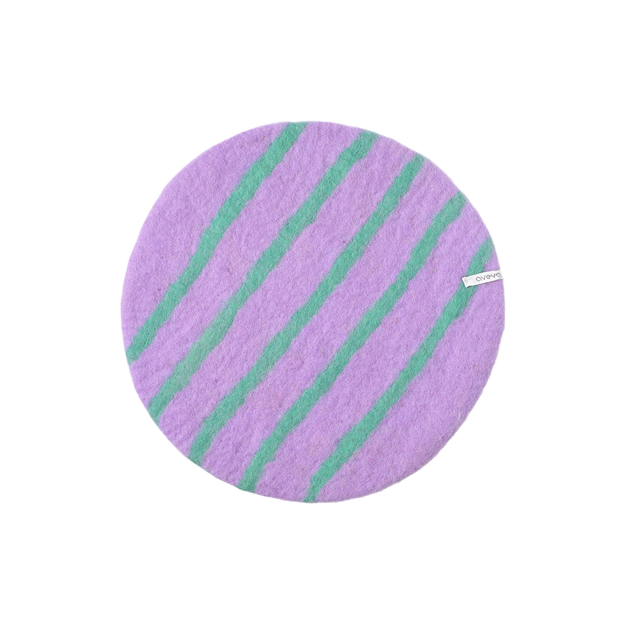 Aveva Seat Cushion in wool felt, available in raw grey or graphic patterns. Round portable chair pads in two sizes, designed in Sweden.