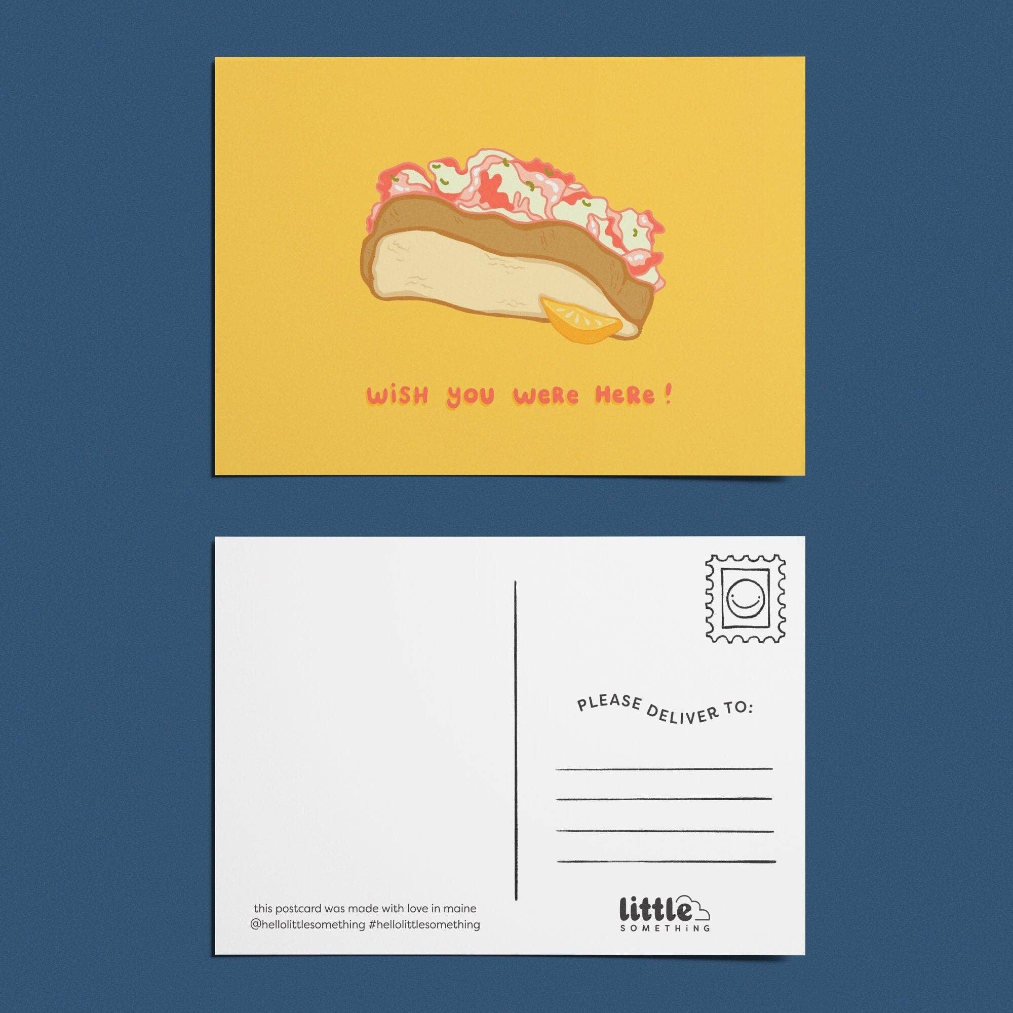 Little Something Co. Lobster Roll Postcard featuring an illustrated Maine lobster roll with lemon wedge and “Wish You Were Here!” on a yellow background.