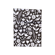 Badger & Burke June Floral Tea Towel. Bold black-and-white floral cotton towel with hanging loop. Pairs perfectly with the June Birch Tray.