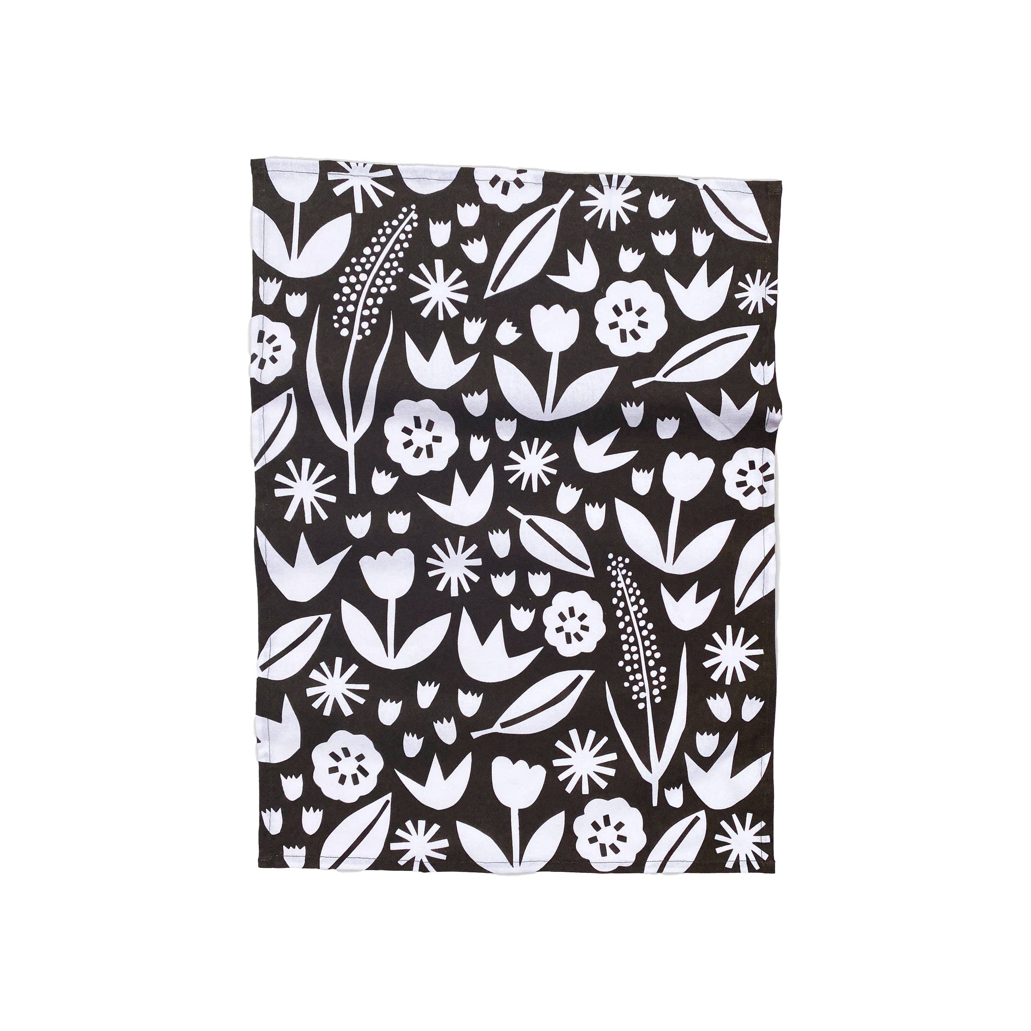 Badger & Burke June Floral Tea Towel. Bold black-and-white floral cotton towel with hanging loop. Pairs perfectly with the June Birch Tray.