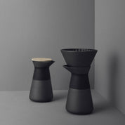 Stelton Theo Set in matte black stoneware with glossy interior, designed by Francis Cayouette. Rustic yet modern Nordic.