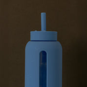 Bink Big Bottle Lounge Straw Cap with wide silicone straw and spill-resistant press-on lid. Dishwasher safe and compatible with the 36 oz Big Bottle.