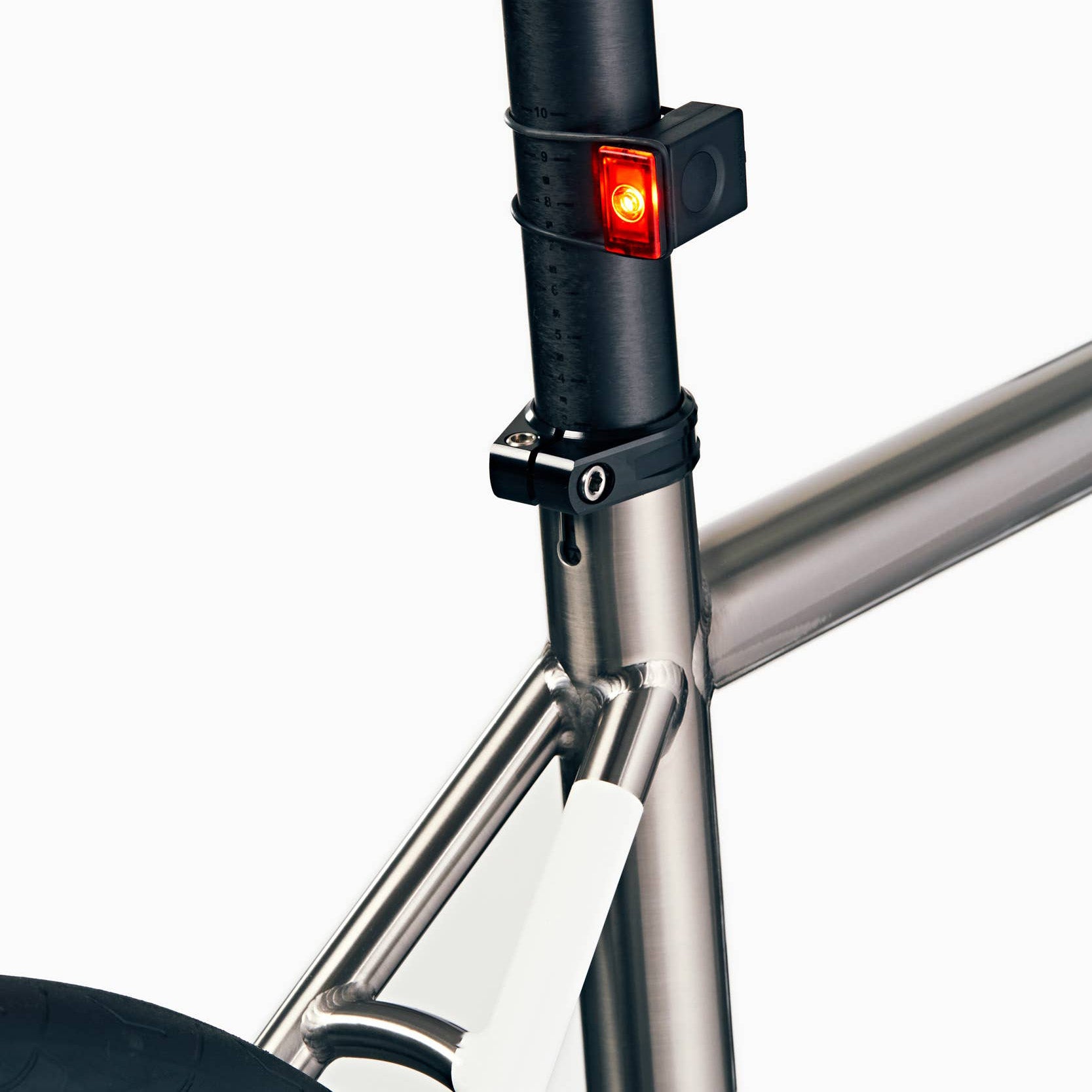 Bookman Block Bike Lights—compact, rechargeable, and easy to mount with elastic bands. Choose Front or Rear, both with 50 lumens, 4 modes, runtimes up to 31 hours, and plastic-free packaging.