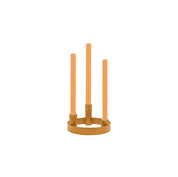 British Colour Standard Round Metal Candelabra Ring in Marigold, handmade steel design holding three taper candles at staggered heights, pictured with Saffron candles.
