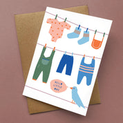 Hello Little One Card by Kautzi Illustrations featuring a colorful clothesline illustration welcoming a new baby.