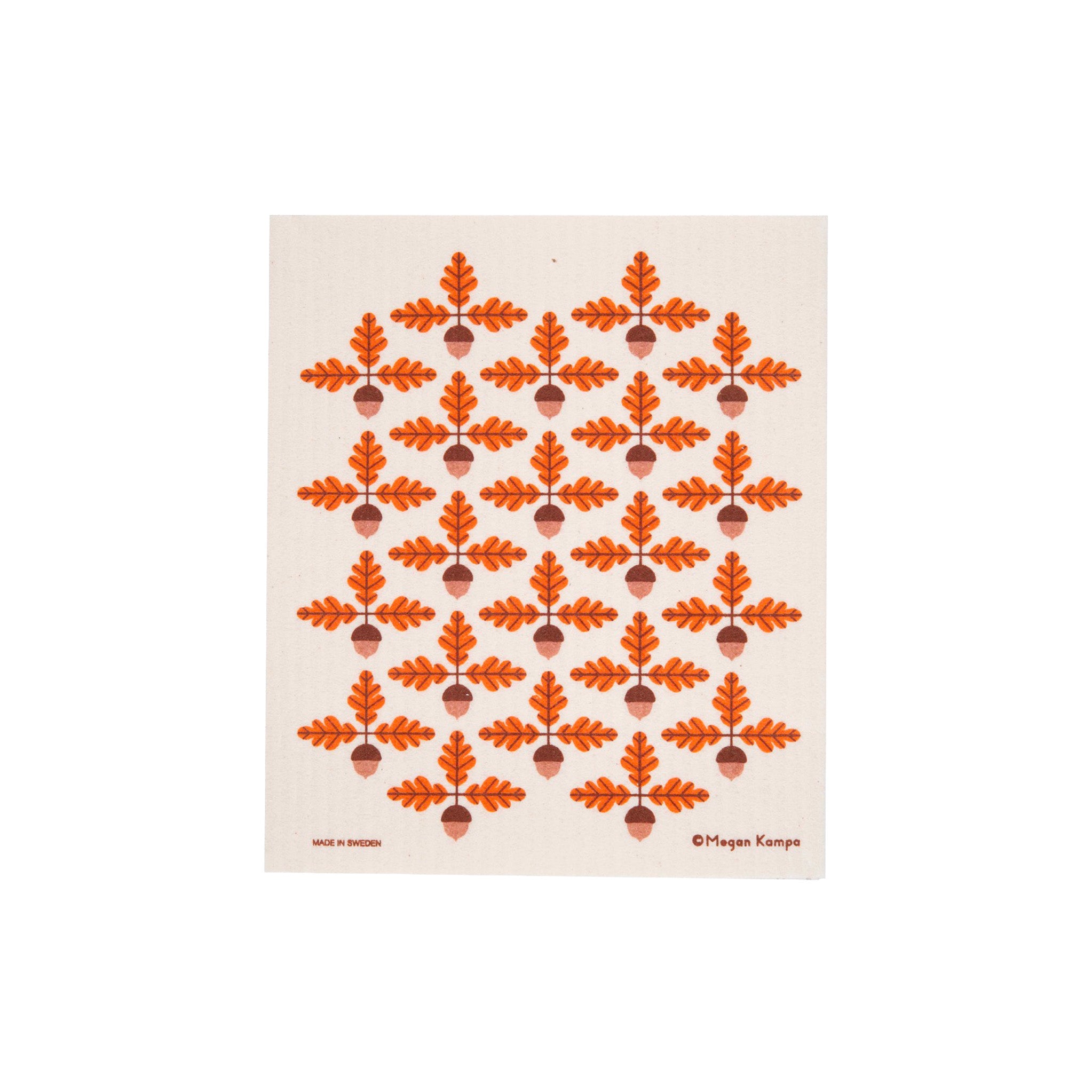 Acorns Swedish Dishcloth by Cose Nuove, designed by Megan Kampa, featuring a repeating geometric pattern of bright orange oak leaves and brown acorns on a natural white background.