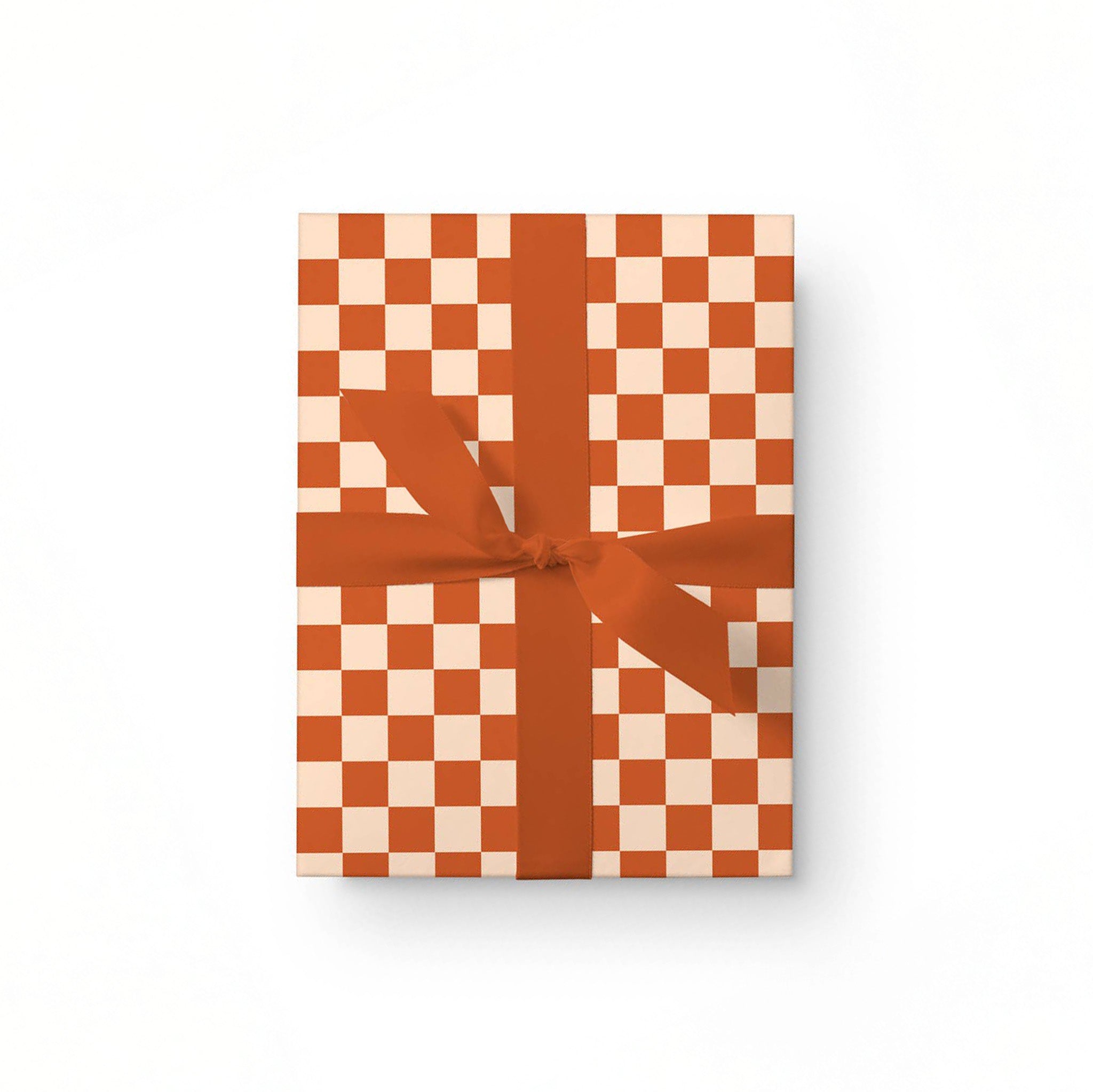 Dahlia Press Checkers Gift Wrap with bold checkerboard pattern in cream and rust-red. Heavy 70# paper, set of 3 sheets, 20 × 29" each.