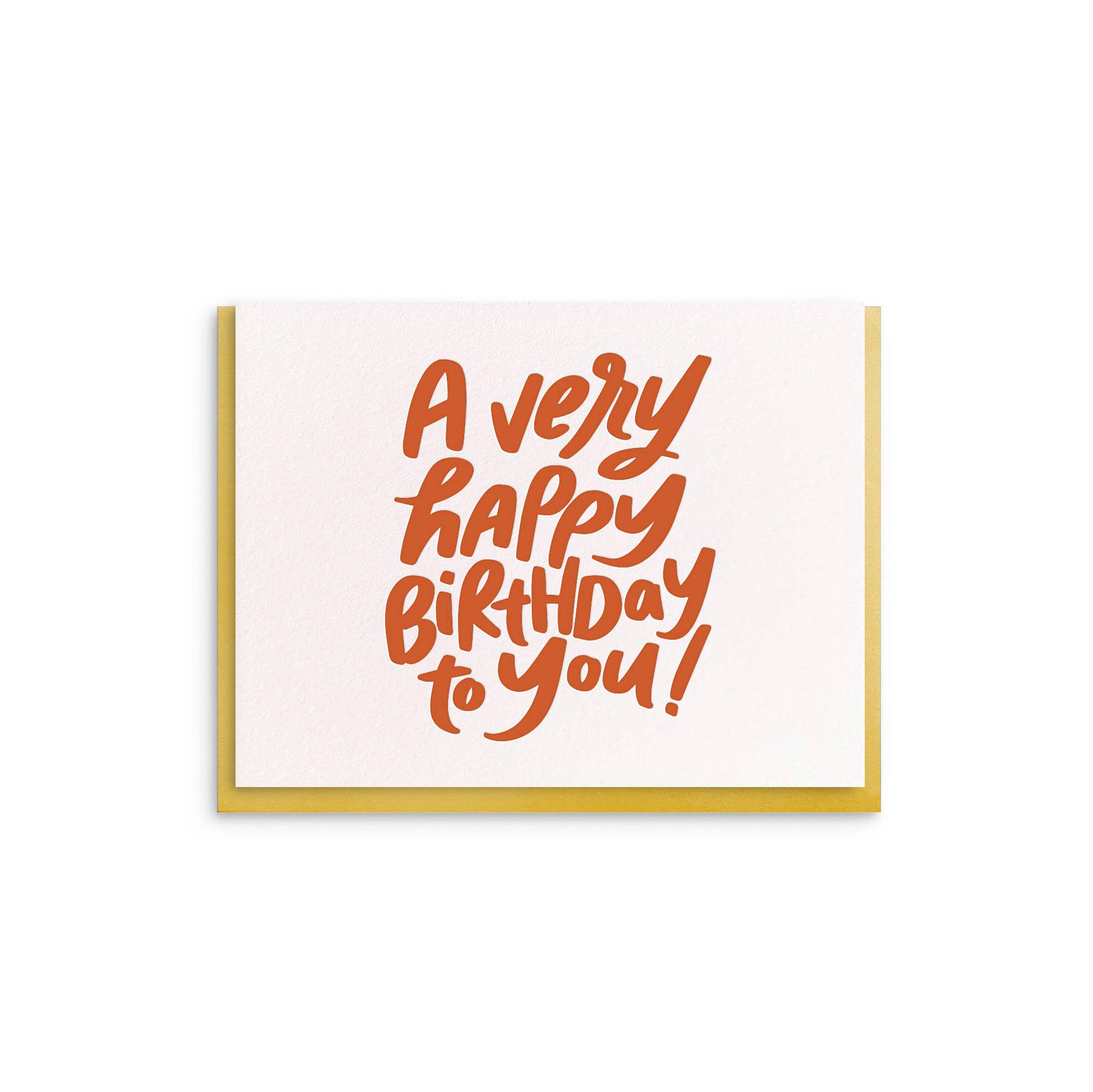 Dahlia Press Very HBD Card with oversized hand-lettered text “A Very Happy Birthday to You!” in orange. Letterpress printed on cotton paper, blank inside, 4.25 × 5.5", envelope included.