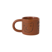 Donna Wilson Bear Mug in warm brown stoneware with hand-drawn bear illustrations and chunky rounded handle.