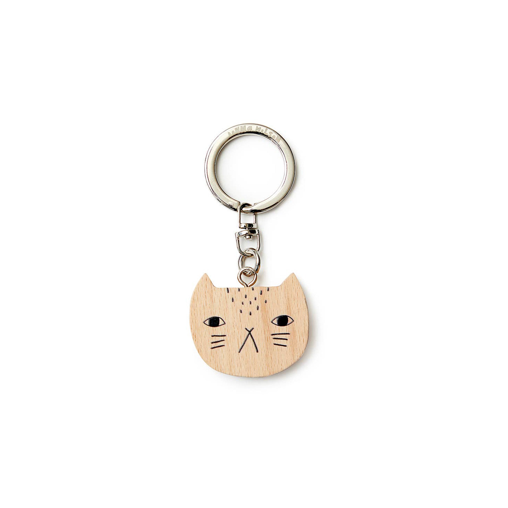 Donna Wilson Mog cat keyring made from FSC-certified wood with a printed cat face and metal key ring.