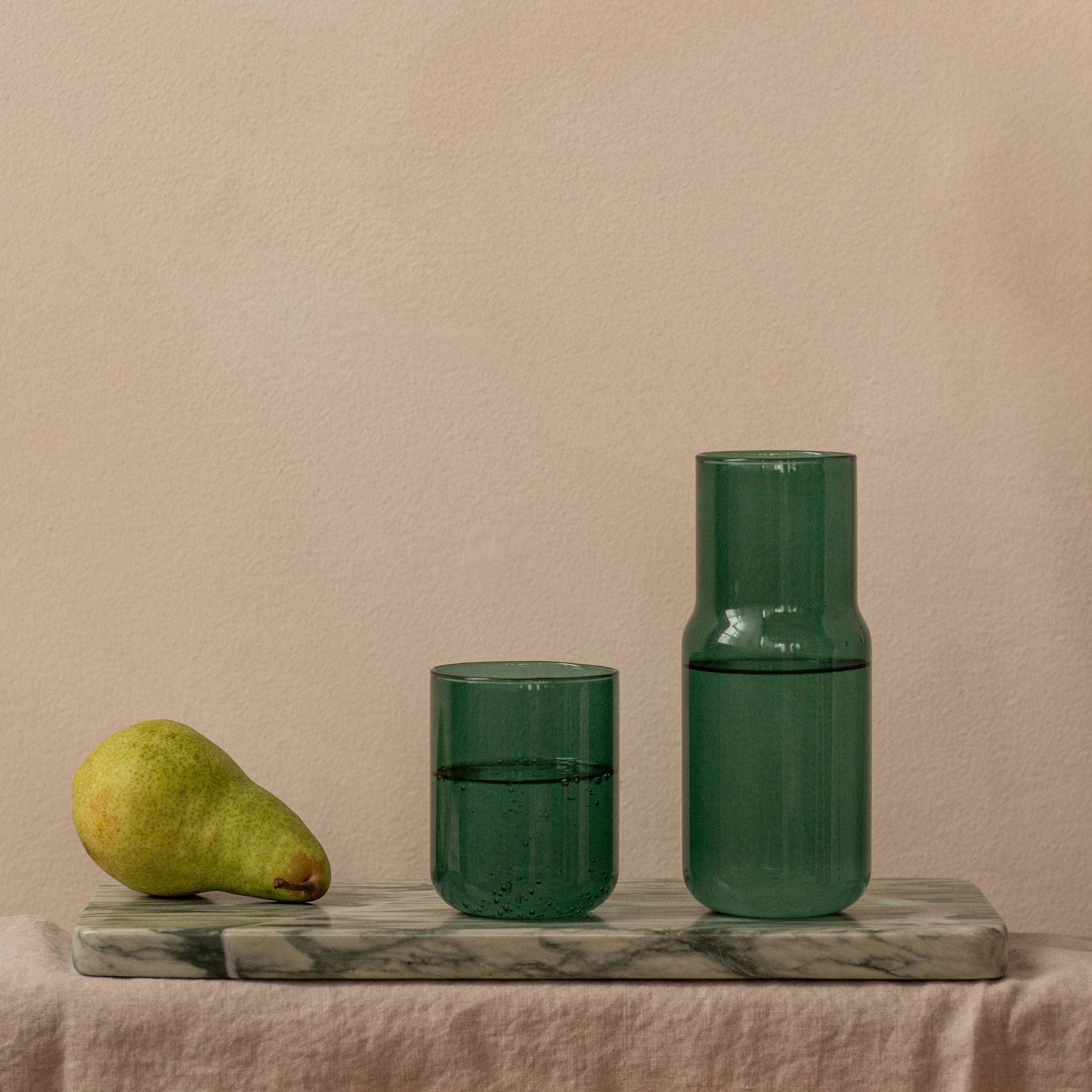 Gry Matter Tinted Glass Carafe and stackable cup in Forest green borosilicate glass with smooth, minimalist design.
