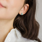 Mint porcelain faceted stud earrings handmade by designer Jenna Vanden Brink, minimalist everyday studs with titanium backs