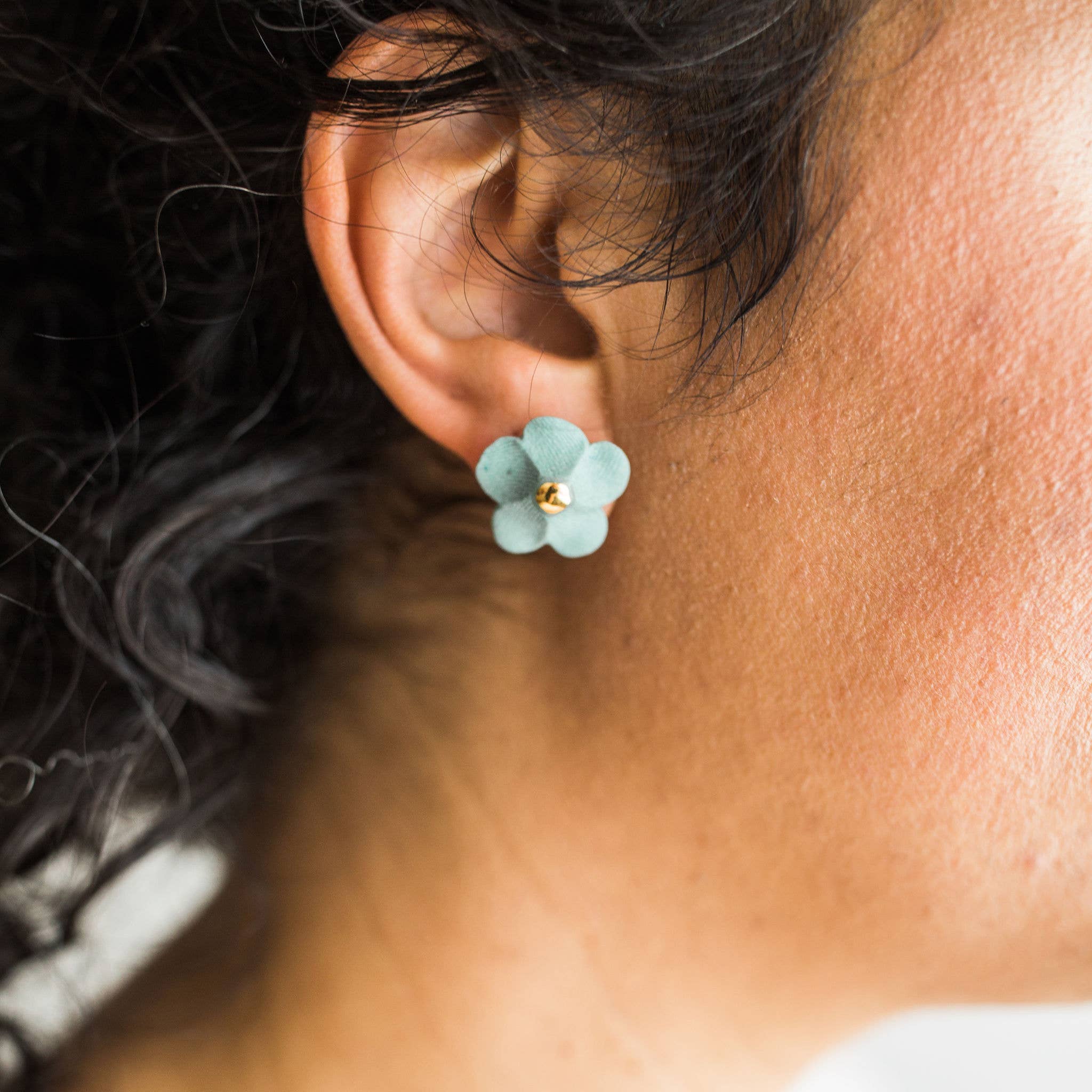 Handmade porcelain Flower Stud earrings by Jenna Vanden Brink with colorful petals and 22K gold luster centers.