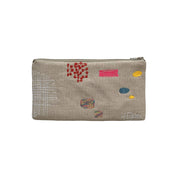 Patches Pouch by K Studio made of natural flax linen with colorful stitched patch motifs, slim rectangular shape, and zip closure on a neutral background.