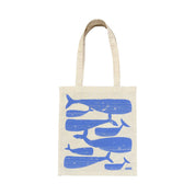 Whale Pod Tote Bag by Kautzi Illustrations with periwinkle blue whales screen-printed on natural cotton.