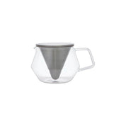 Kinto CARAT glass teapot with stainless steel conical filter, available in 600 ml and 850 ml sizes, shown brewing loose-leaf tea.