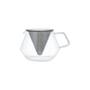 Kinto CARAT glass teapot with stainless steel conical filter, available in 600 ml and 850 ml sizes, shown brewing loose-leaf tea.