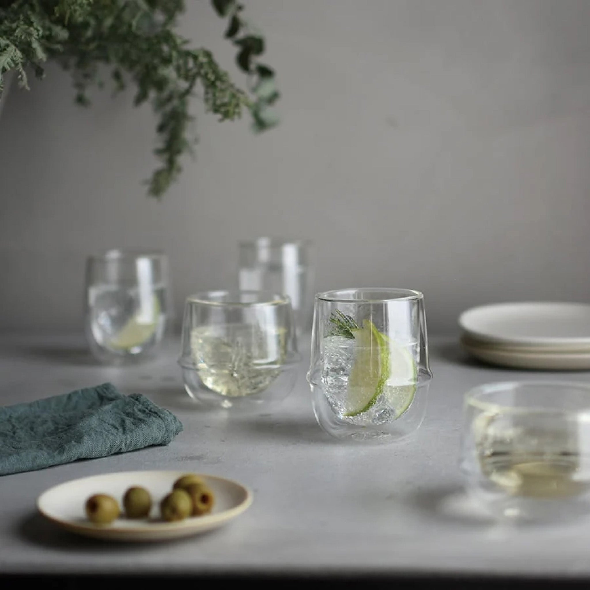 Kinto Kronos Double Wall Coffee Cup in clear double-wall heat-resistant glass.