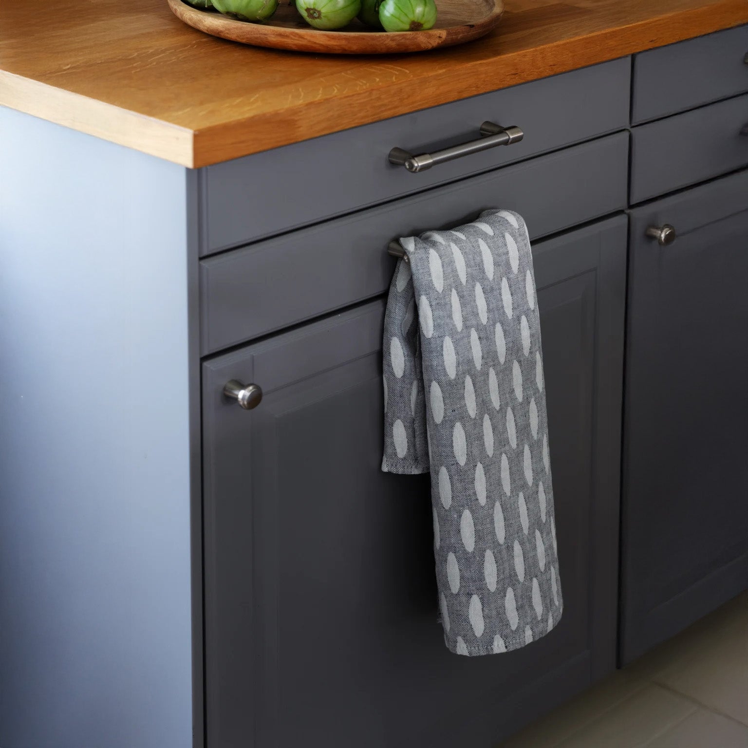 Lapuan Kankurit Helmi Linen Towel in dot pattern. Eco-friendly 100% linen, absorbent, quick-drying, and versatile for kitchen or bath.