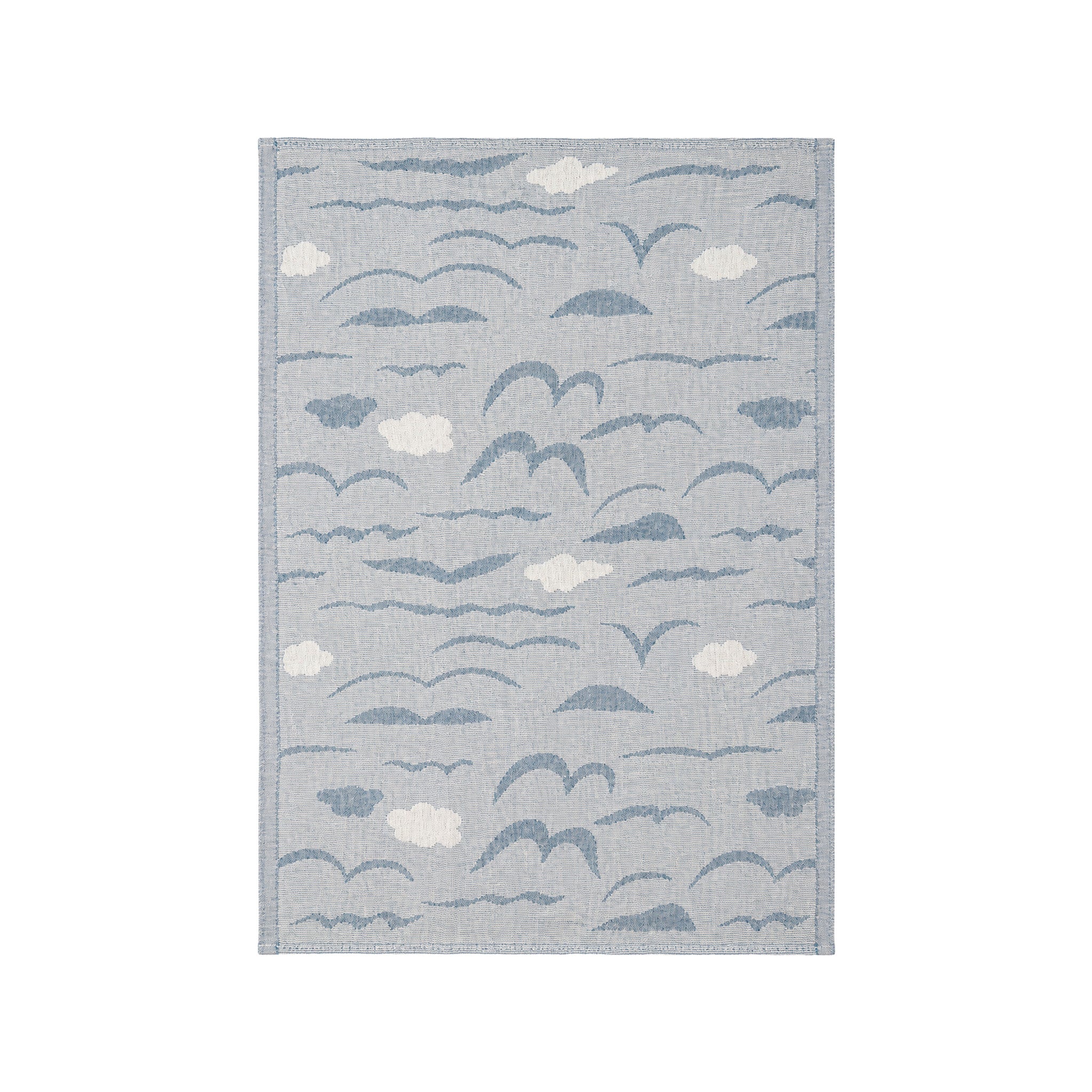Lapuan Kankurit Rannalla linen kitchen towel featuring blue seabirds and cloud motifs by Armi Teva on soft white washed linen with a hanging loop.