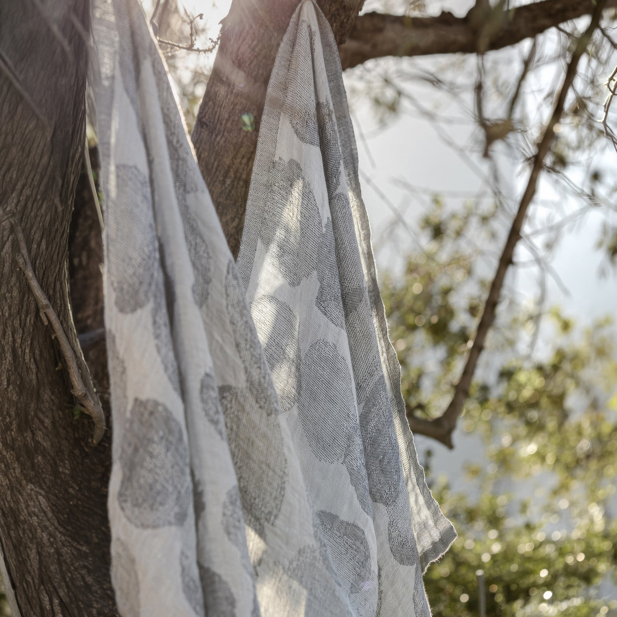 Lapuan Kankurit Sade extra-large linen towel designed by Aoi Yoshizawa with a soft rain-inspired striped pattern, woven in Finland from 100% washed linen.