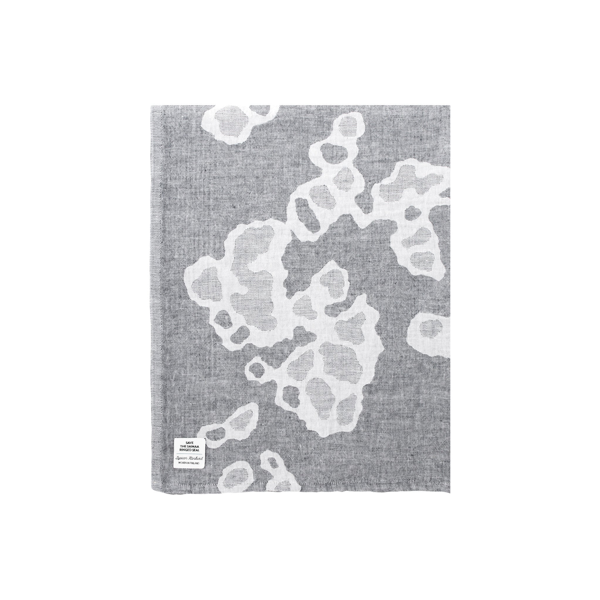 Lapuan Kankurit Saimaannorppa extra-large linen towel designed by Kaarina Tiainen in a white and grey seal pattern, woven in Finland from 100% washed linen.