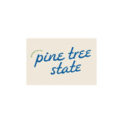 Little Something Co. Greetings from the Pine Tree State Postcard with retro blue lettering and small green text on a cream background.