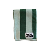 Striped Local Beach beach towel made from heavyweight 100% cotton jacquard terry, featuring a soft, absorbent design ideal for the beach, pool, lake, or bath.